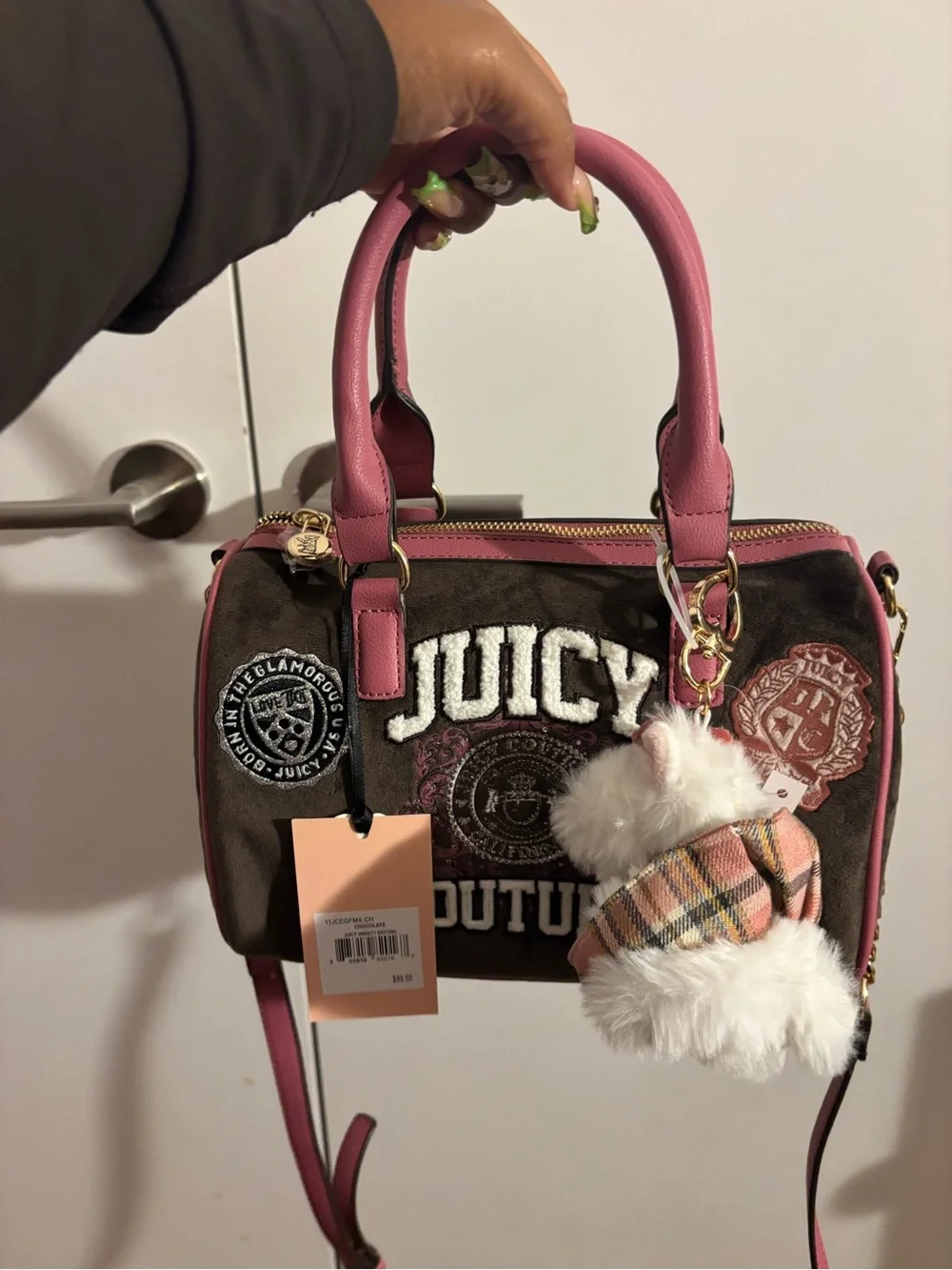 Juicy Couture varsity satchel color is chocolate Accent Logo Satchel